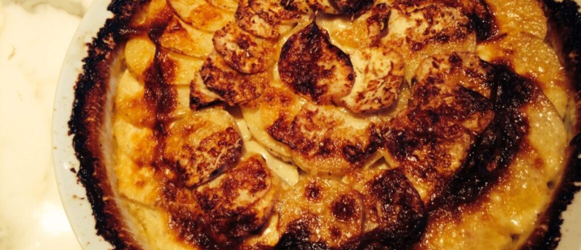 yukon and japanese sweet potato au gratin