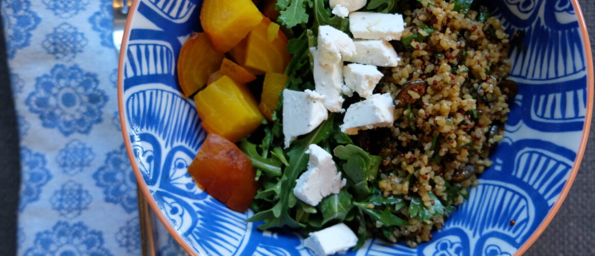 composed salad of golden beets, arugula and grains w/ lemony herb dressing