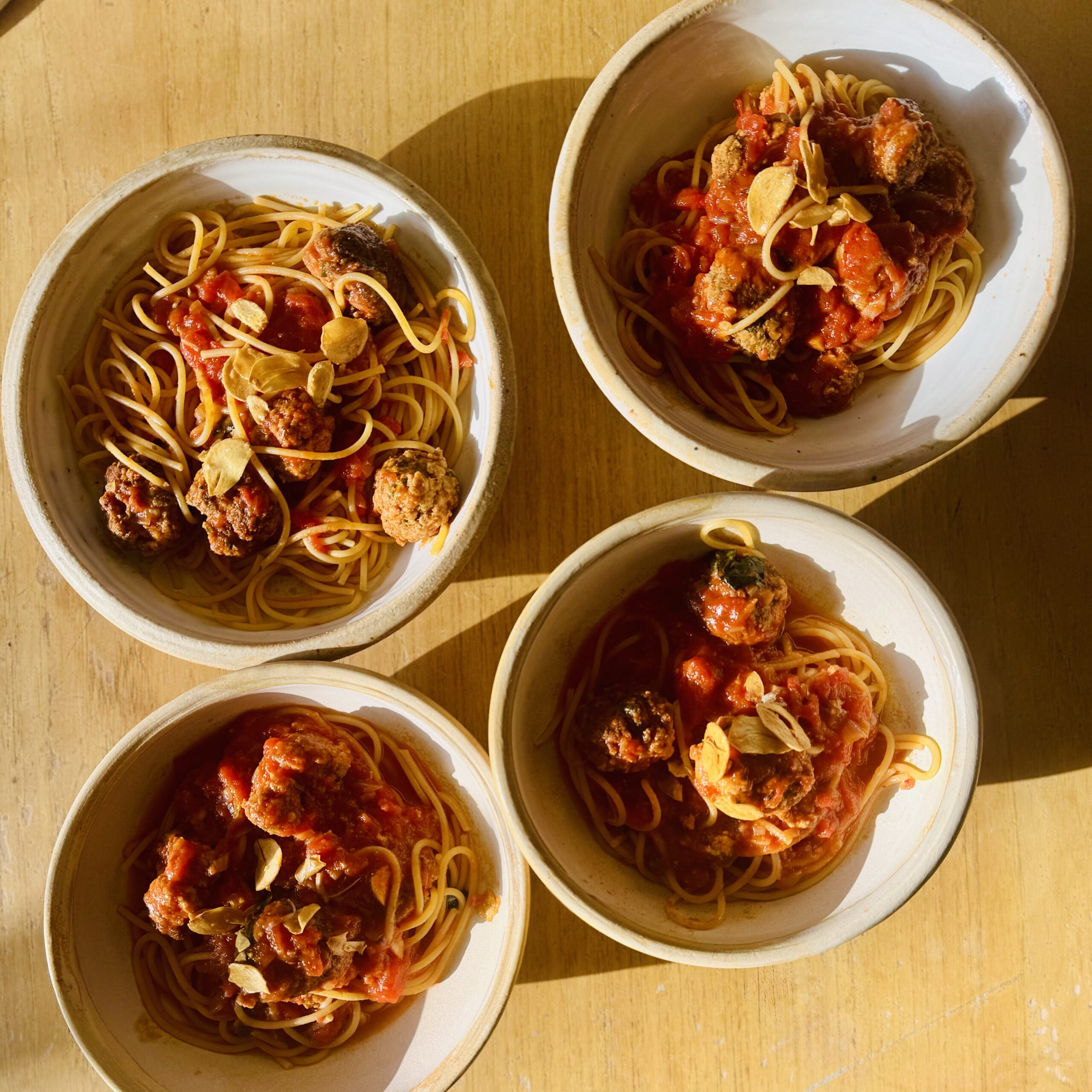 Meatballs in Spicy Tomato Sauce with Crispy Garlic Chips